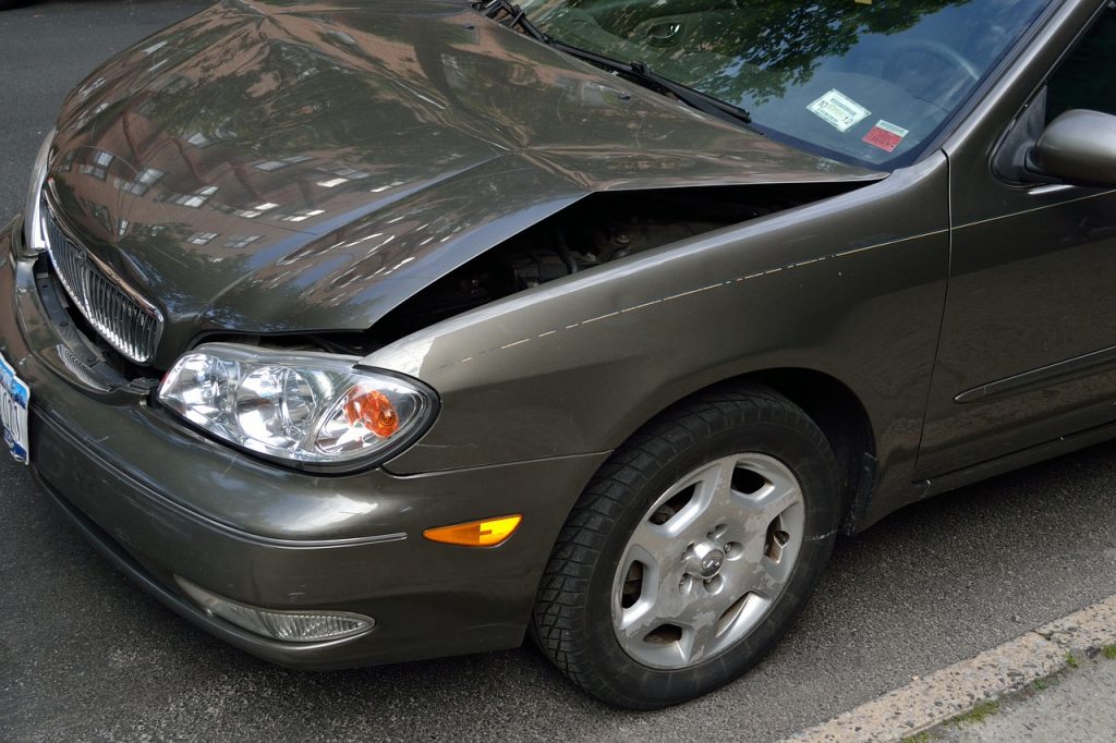 Is it Worth it to Claim Insurance for a Small Scratch and Dent on a Car? 1