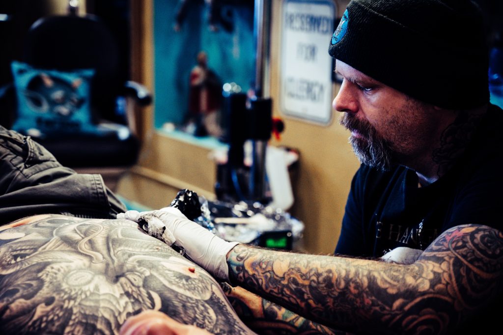 What's the Job Description, Salary, and Benefits of a Tattoo Artist