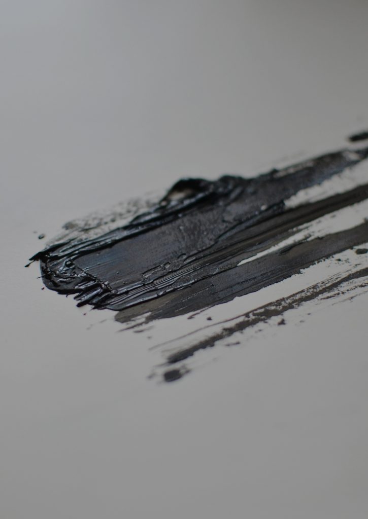 What two colors make black